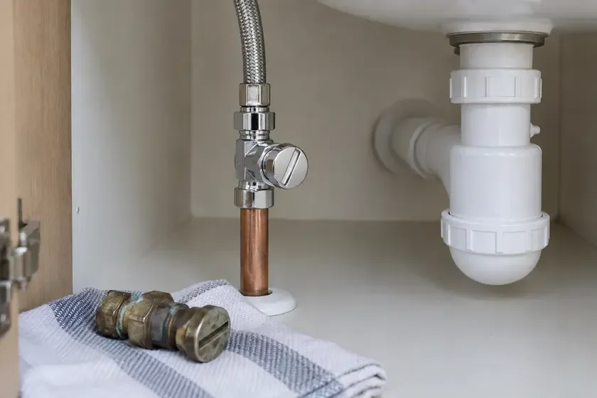 New slotted isolation valve fitted to a basin supply pipe.